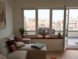 Studio rénové vue mer latéral & parking à Westende by La Conciergerie