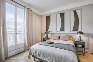 Appartements Han - 3 chambres et balcon a Trocadero : photos des chambres