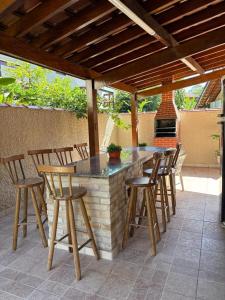 Casa 30 m da praia,condomínio Tenório