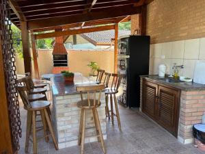 Casa 30 m da praia,condomínio Tenório