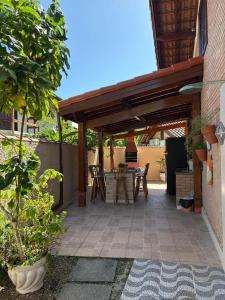 Casa 30 m da praia,condomínio Tenório