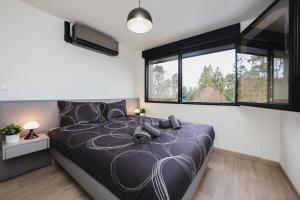 Maisons de vacances Le Naturiste Loft with Jacuzzi : photos des chambres
