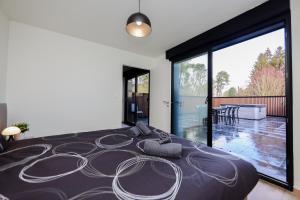 Maisons de vacances Le Naturiste Loft with Jacuzzi : photos des chambres
