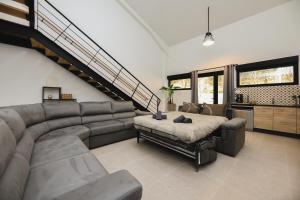 Maisons de vacances Le Naturiste Loft with Jacuzzi : photos des chambres