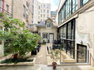 Love House - Maison entière et son jardin - Rare à Paris