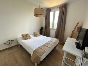 Appartements Charmant T3 lumineux : photos des chambres