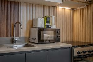 Private Apartment - 1BR Aljada Home - Sleeps 4