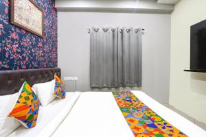 FabHotel Galaxy Suites