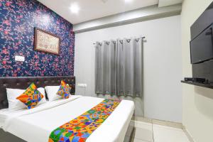 FabHotel Galaxy Suites