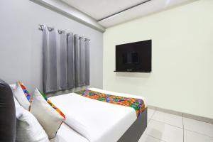 FabHotel Galaxy Suites