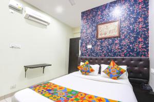 FabHotel Galaxy Suites