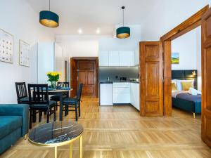 Golden Market Square Apartments by Tyzenhauz