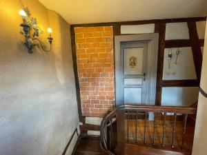 Appartements La Maison Bleue - Historic House in the Heart of Riquewihr : photos des chambres