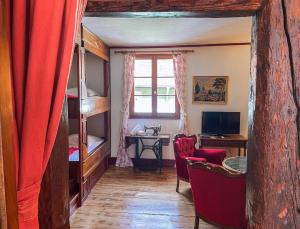 Appartements La Maison Bleue - Historic House in the Heart of Riquewihr : photos des chambres