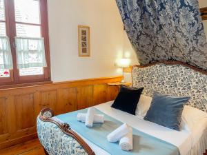Appartements La Maison Bleue - Historic House in the Heart of Riquewihr : photos des chambres