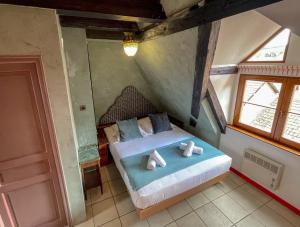 Appartements La Maison Bleue - Historic House in the Heart of Riquewihr : photos des chambres