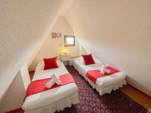Appartements La Maison Bleue - Historic House in the Heart of Riquewihr : photos des chambres