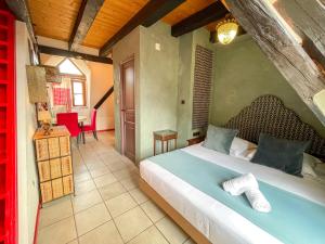 Appartements La Maison Bleue - Historic House in the Heart of Riquewihr : photos des chambres