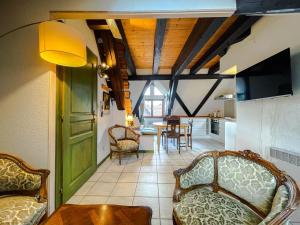 Appartements La Maison Bleue - Historic House in the Heart of Riquewihr : photos des chambres