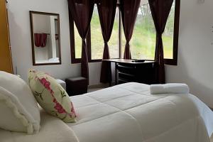 Casa de montaña con vista, BBQ y wifi confiable