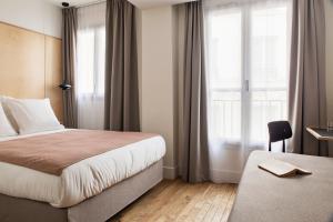 Classic Triple Room room in Newhotel Opéra