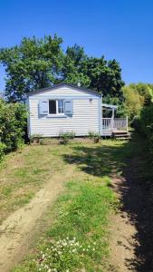 Mobil-home climatisé dans parc résidentiel avec piscine