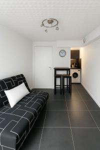 Appartements Le Fonctionnel : photos des chambres