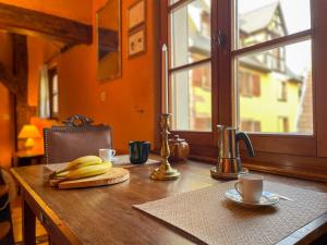 Appartements La Maison Bleue - Historic House in the Heart of Riquewihr : photos des chambres