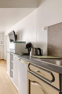 Appartements Les Studios Parfaitement Imparfaits - Lens Louvre-Bollaert : photos des chambres