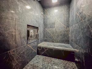 Appartements La Suite - Jacuzzi - Hammam : photos des chambres