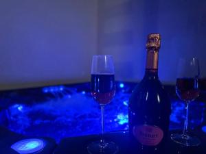 Appartements La Suite - Jacuzzi - Hammam : photos des chambres
