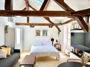 Appartements Charme ancien, confort moderne : photos des chambres