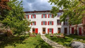 Appartements La Grande Maison Rouge : photos des chambres
