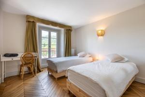 Appartements La Grande Maison Rouge : photos des chambres