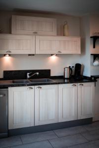 Appartements La Grande Maison Rouge : photos des chambres