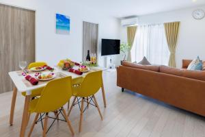 沖縄うるま市 最大9名OK BBQ 徒歩1分で天然ビーチ 広々3部屋の快適ステイ Villa Ohana