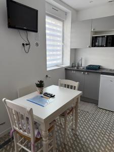 Appartements Charmant studio prive equipe : photos des chambres