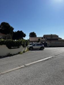 Villas Maison de vacances moderne et pratique : WiFi, clim, parking et cour privee : photos des chambres