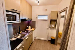 Appartements Studio Cosy Centre ville : photos des chambres