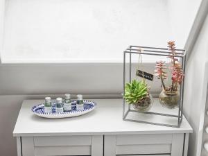 Appartements F2 cosy avec balcon : photos des chambres