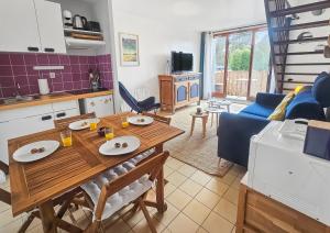 Appartements F2 cosy avec balcon : photos des chambres