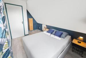 Appartements F2 cosy avec balcon : photos des chambres