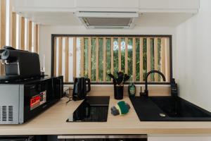 Appartements BaliRhone - Spa prive & balcon avec vue : photos des chambres