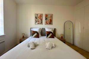 Appartements Le Repaire des Remparts : photos des chambres
