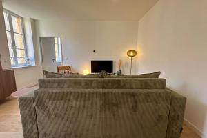 Appartements Le Repaire des Remparts : photos des chambres