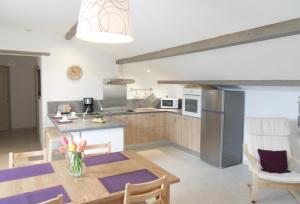 Appartements Fleur de Thym : photos des chambres