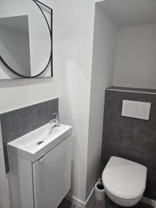 Appartements Au coeur du vieux village : photos des chambres