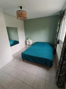 Appartements charmant T2 avec jardin et parking : photos des chambres