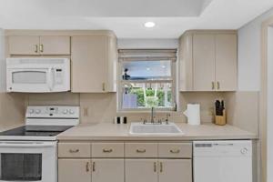 437 NE 107th · Pool Hot Tub Patio 5 Bedrooms 3 BathsParking