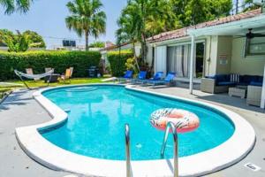 437 NE 107th · Pool Hot Tub Patio 5 Bedrooms 3 BathsParking